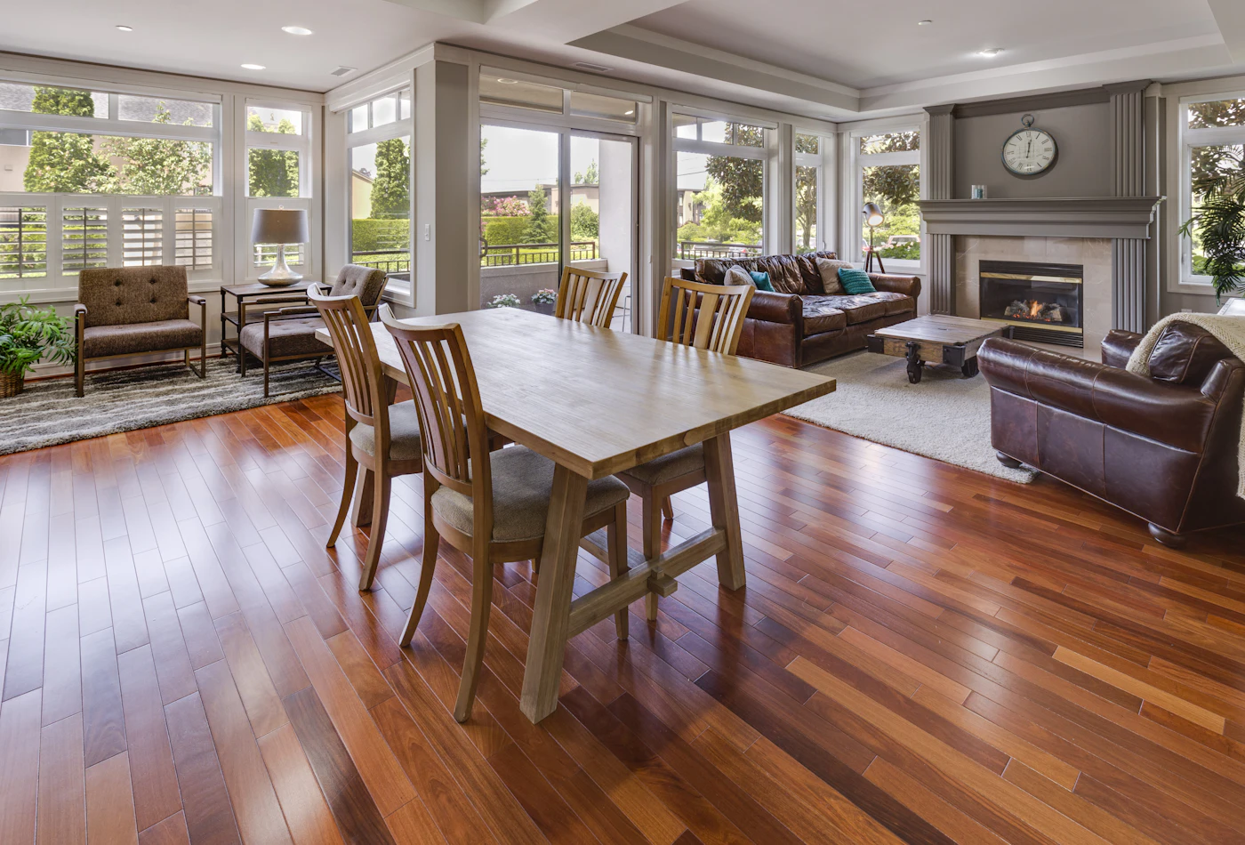 After: richly finished hardwood floor in a bright living room