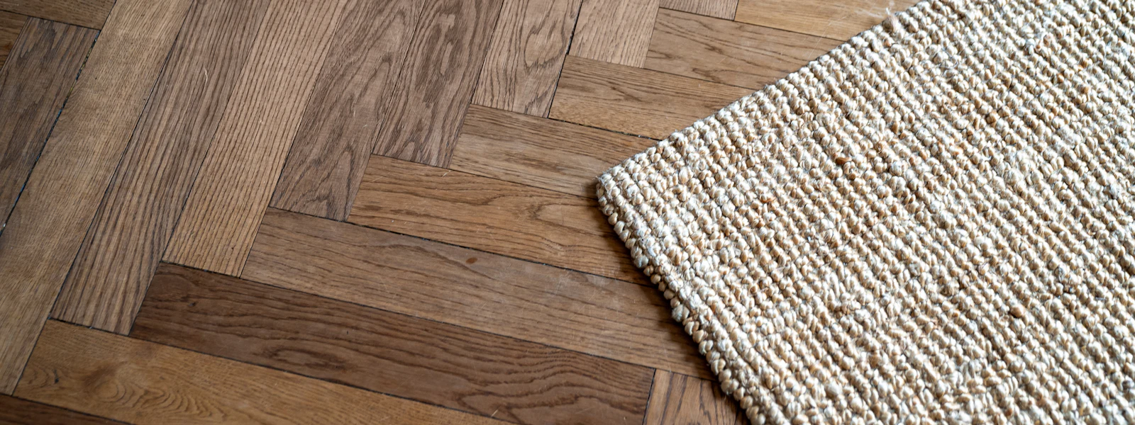 Close-up of premium herringbone flooring craftsmanship